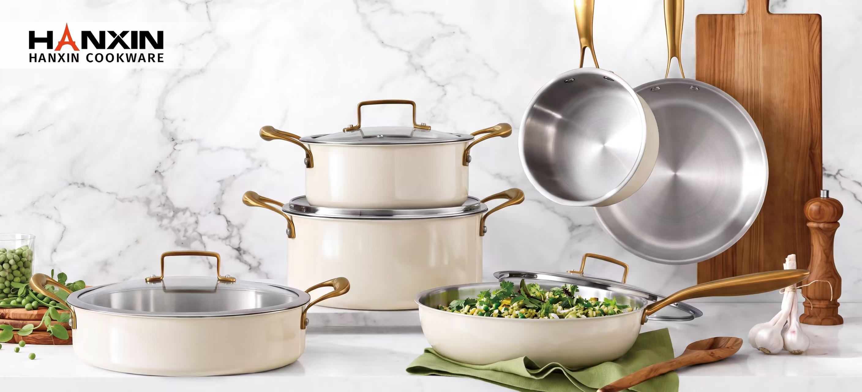 HANXIN cookware collection featuring cream-colored finishes and gold-colored handles